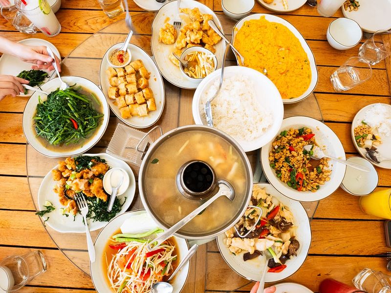 A group of people eating at a table