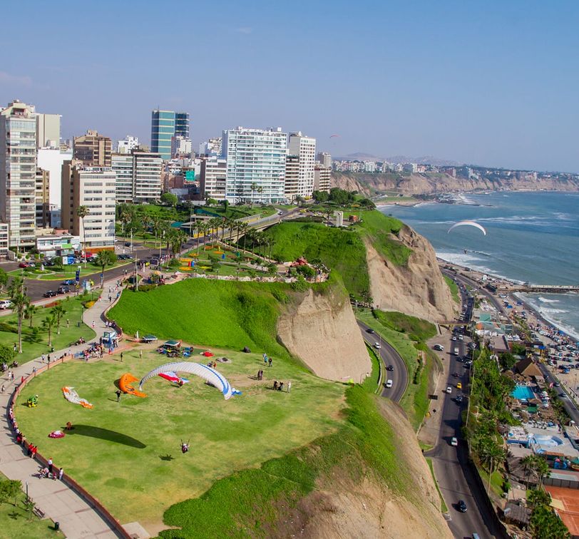 A coastal city atop a series of cliffs