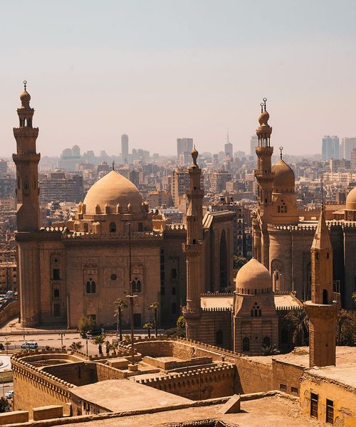 The city skyline of Cairo, Egypt featuring many turrets and domed buildings