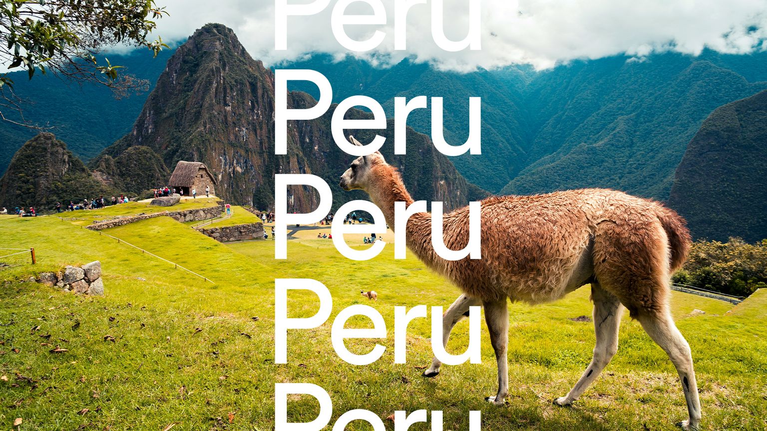 A llama stands on grass with Machu Picchu in the background, under five large "Peru" texts stacked vertically on the left.