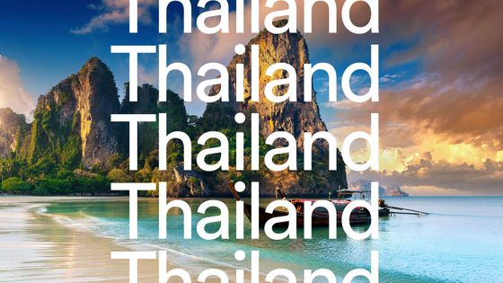 Scenic beach in Thailand with turquoise water, limestone cliffs, and a traditional longtail boat under a cloudy sky. The word "Thailand" repeated.