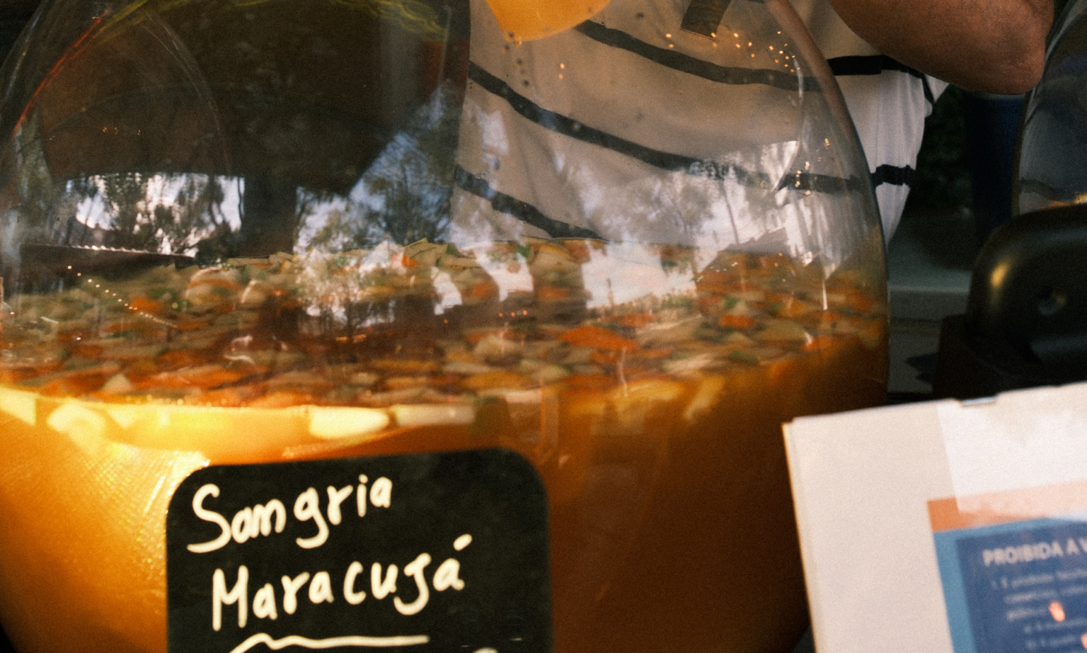 A pitcher full of orange sangria.