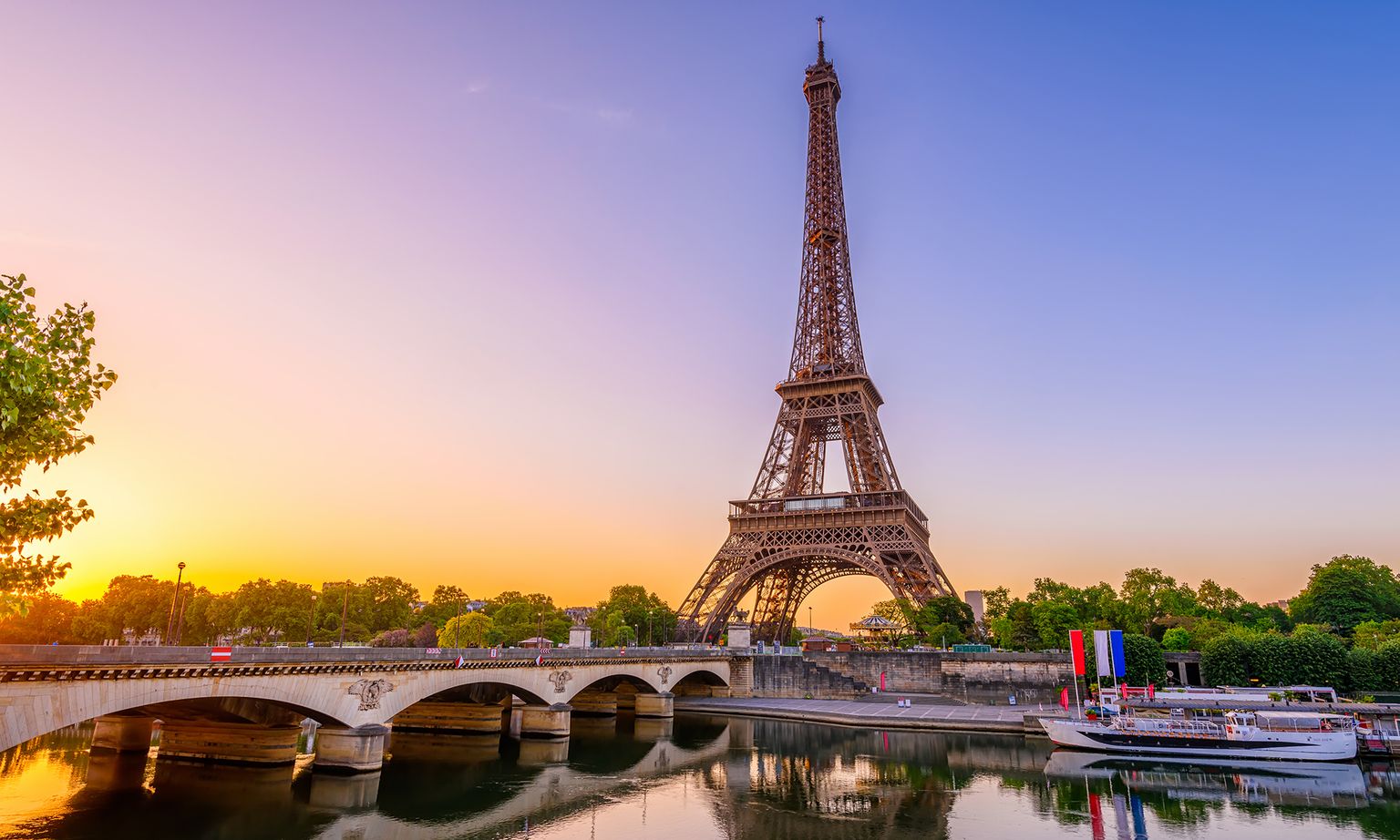 The Eiffel Tower in Paris at sunset.