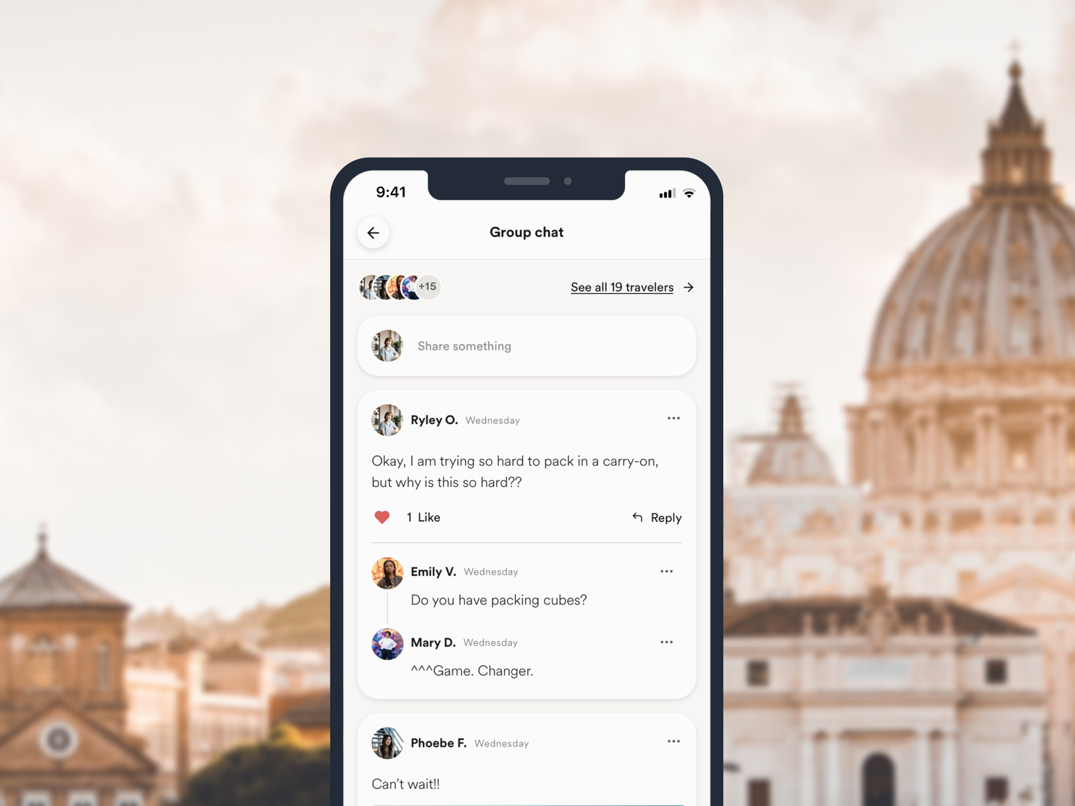 Smartphone screen showing a group chat with messages about packing tips. Background features a blurred historical building with a dome.