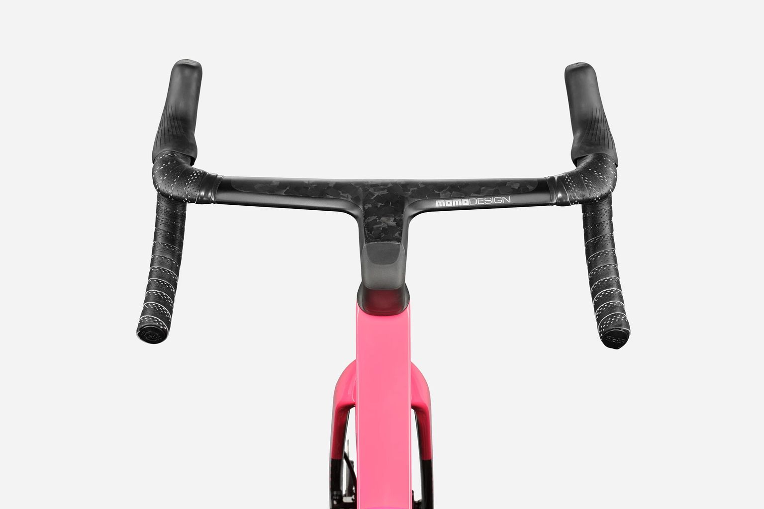 Front view of pink road bike with integrated carbon handlebar/stem and black wrapped drop bars.