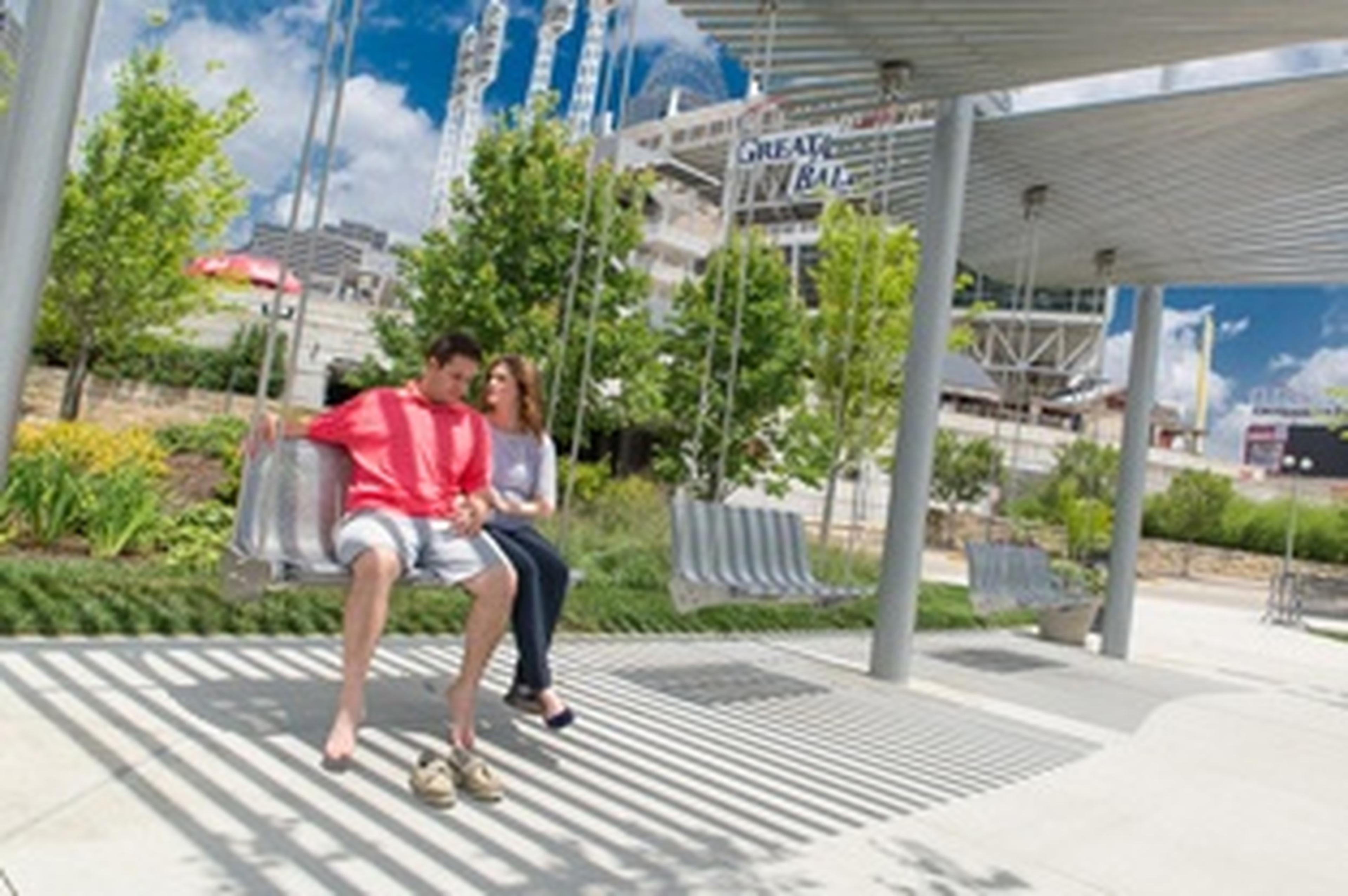 couple on swing downtown