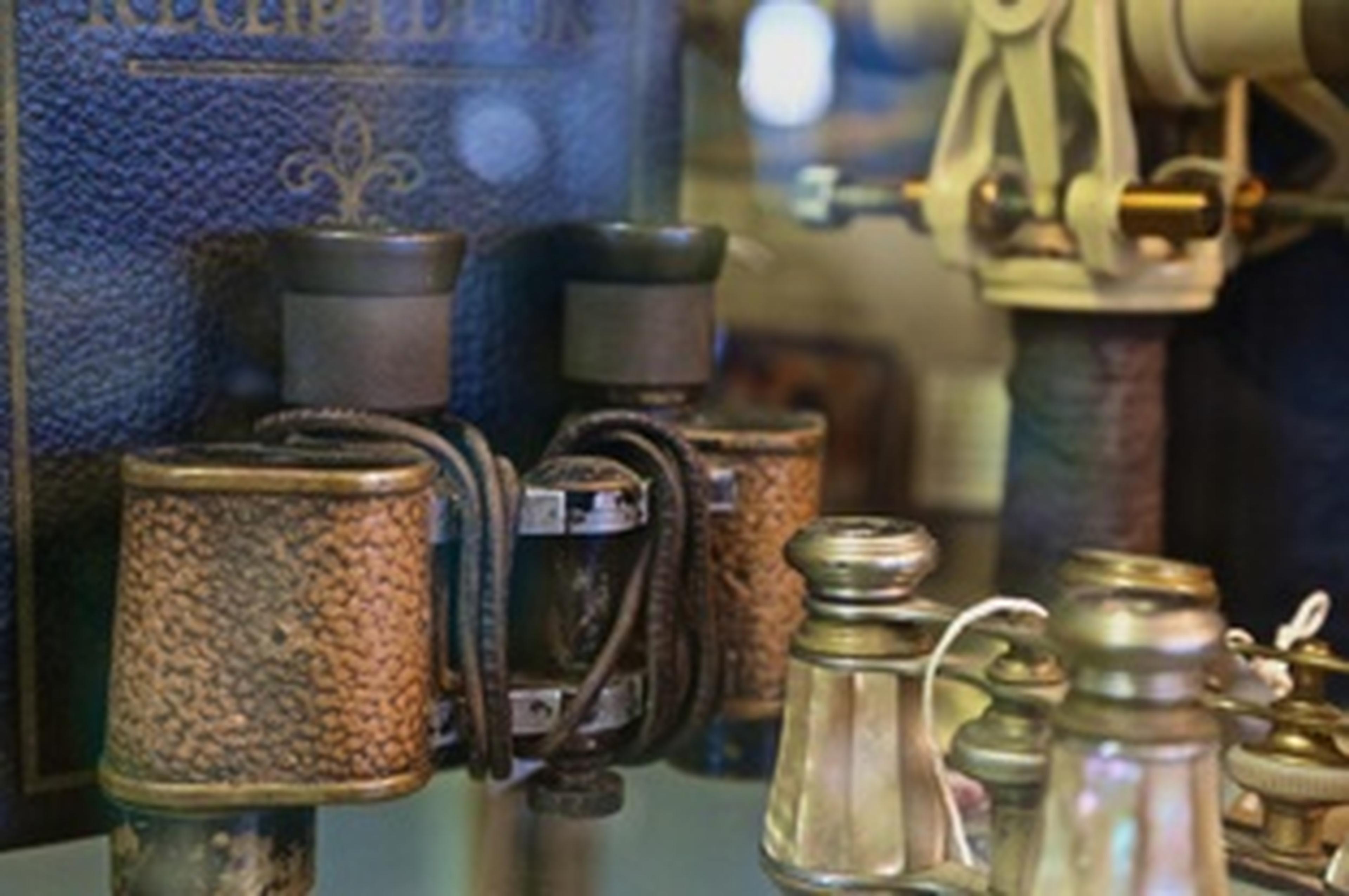 antique binoculars and salt shakers
