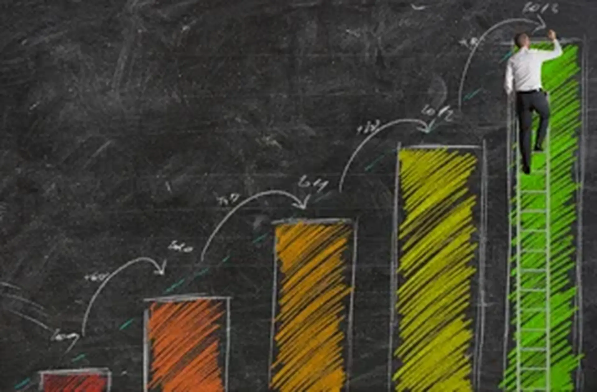man on chalkboard climbing graph