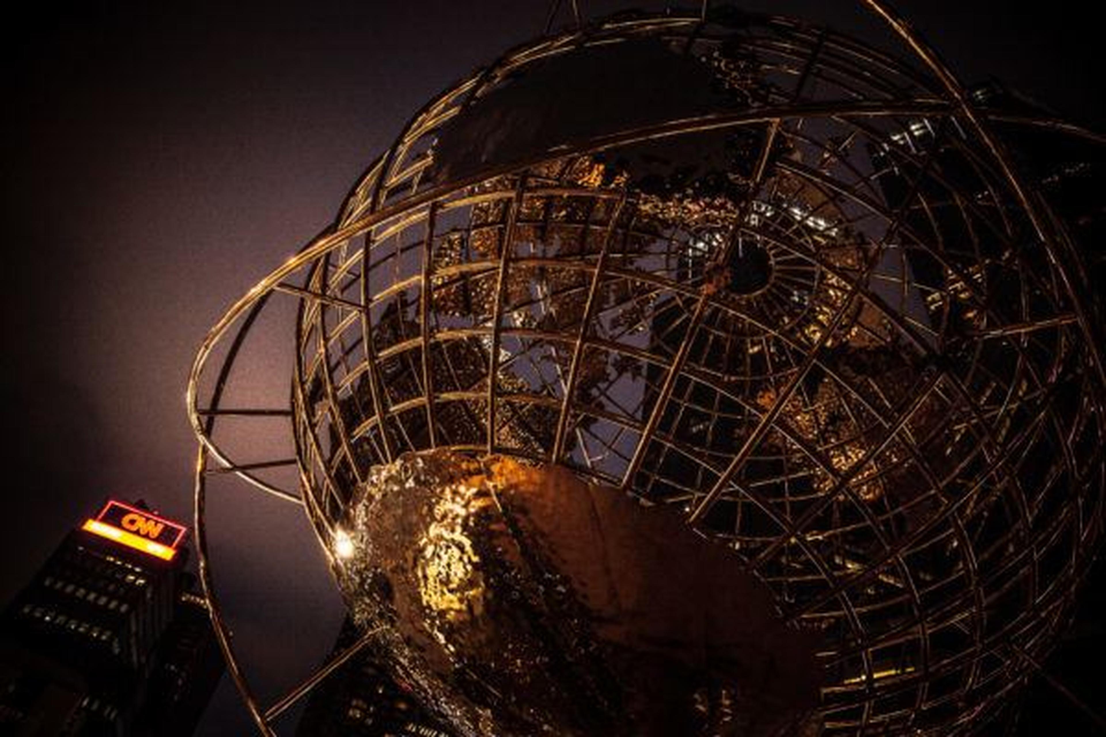 globe with CNN sign behind it