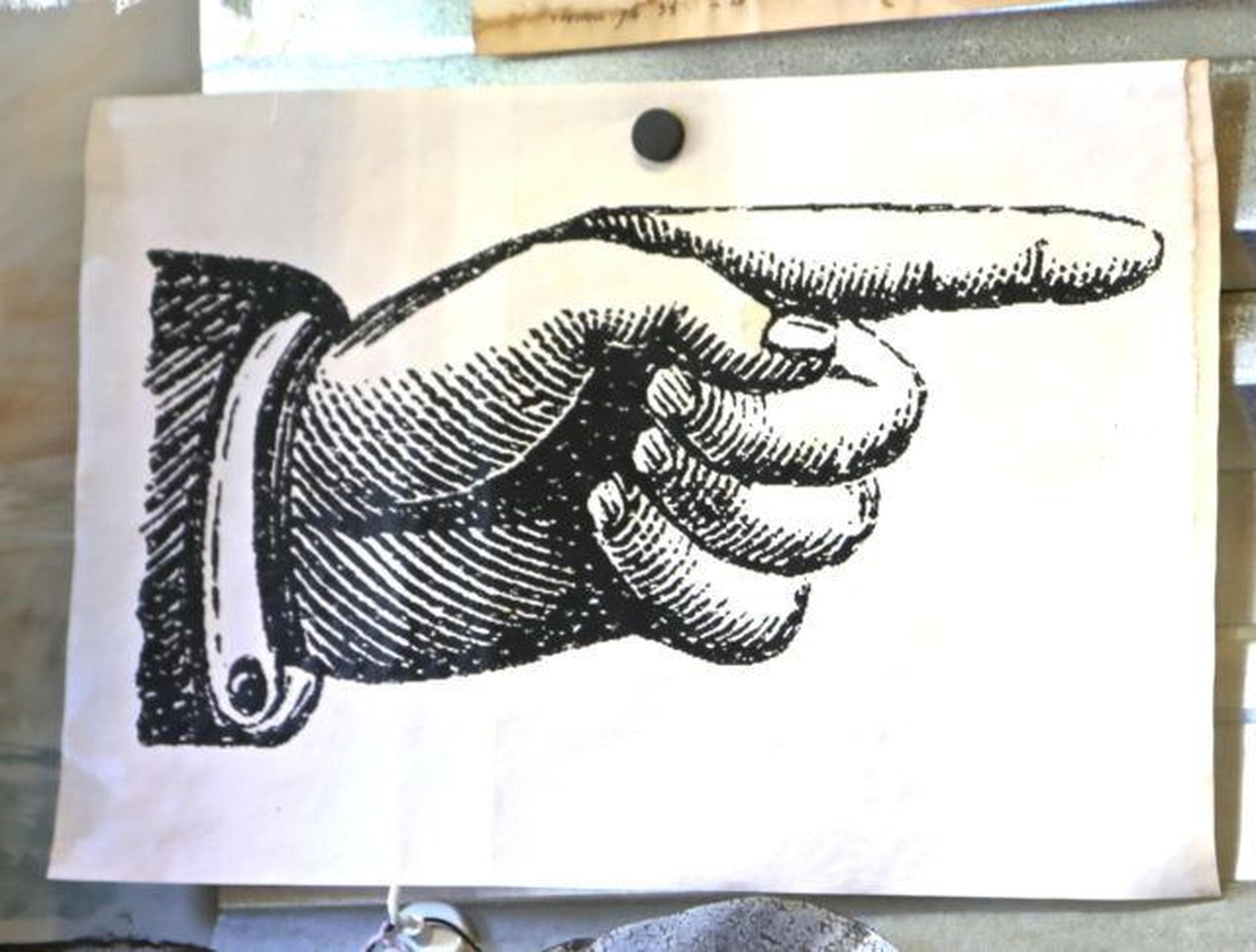 drawing of hand pointing right