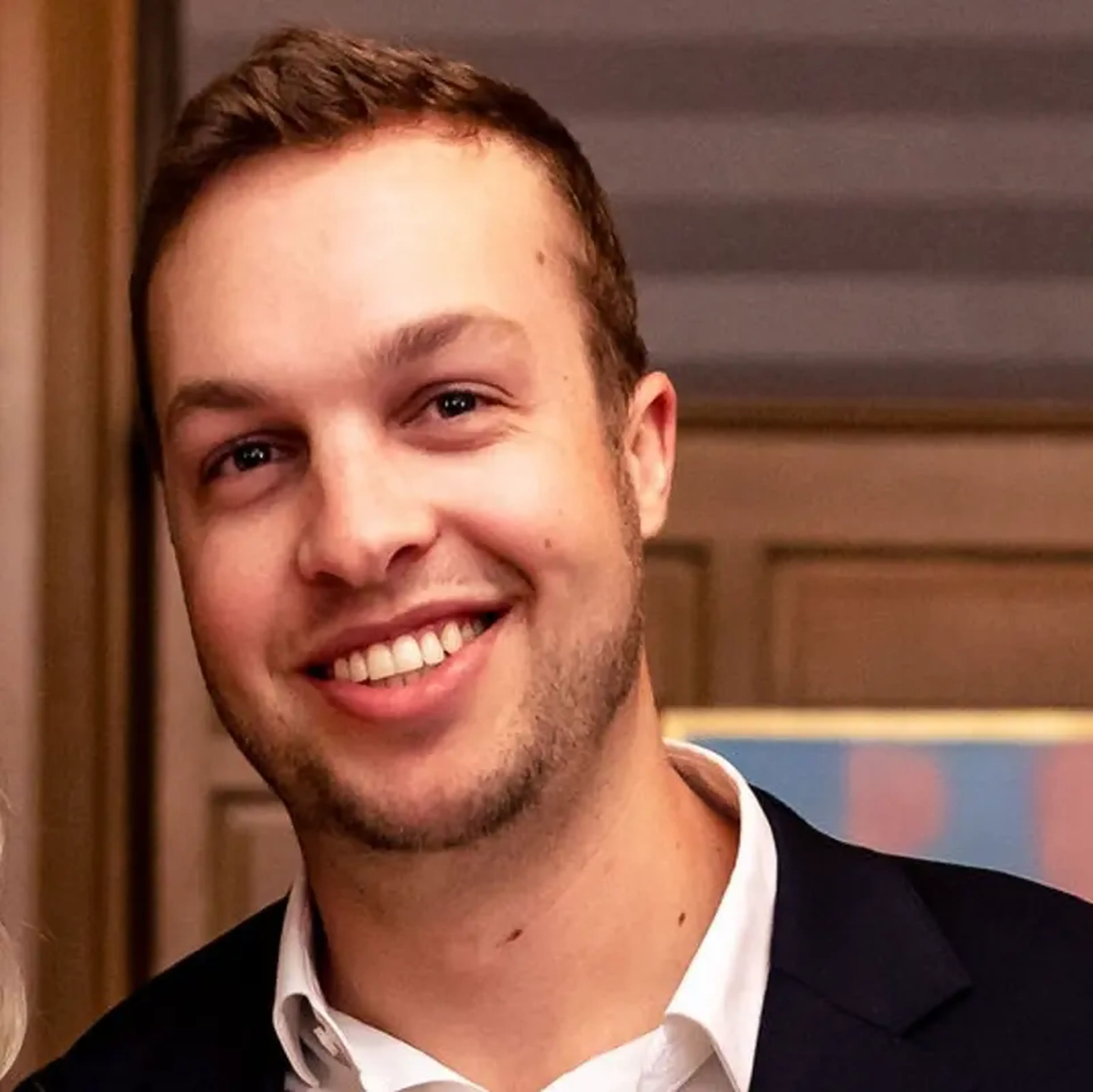 A headshot of Ryan Boothe