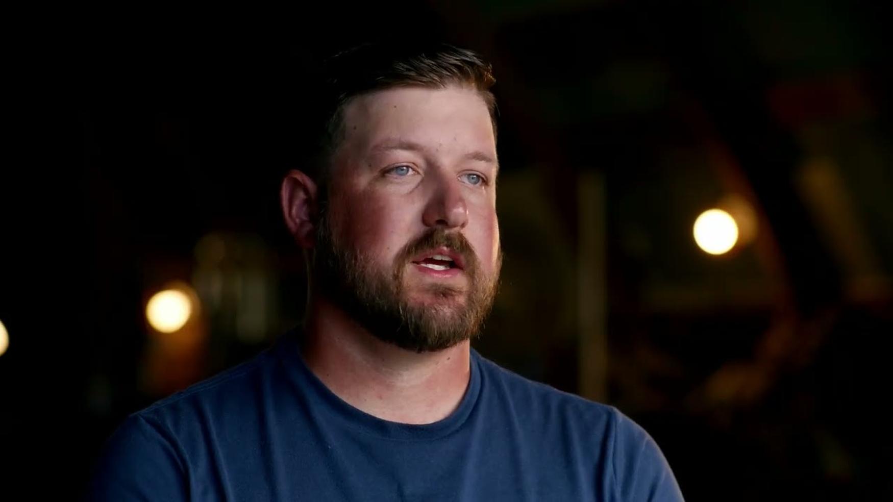 Close-up of Caleb, an employee in Field Injection Operations at Charm Industrial, featured in a video about his work in bio-oil carbon sequestration.