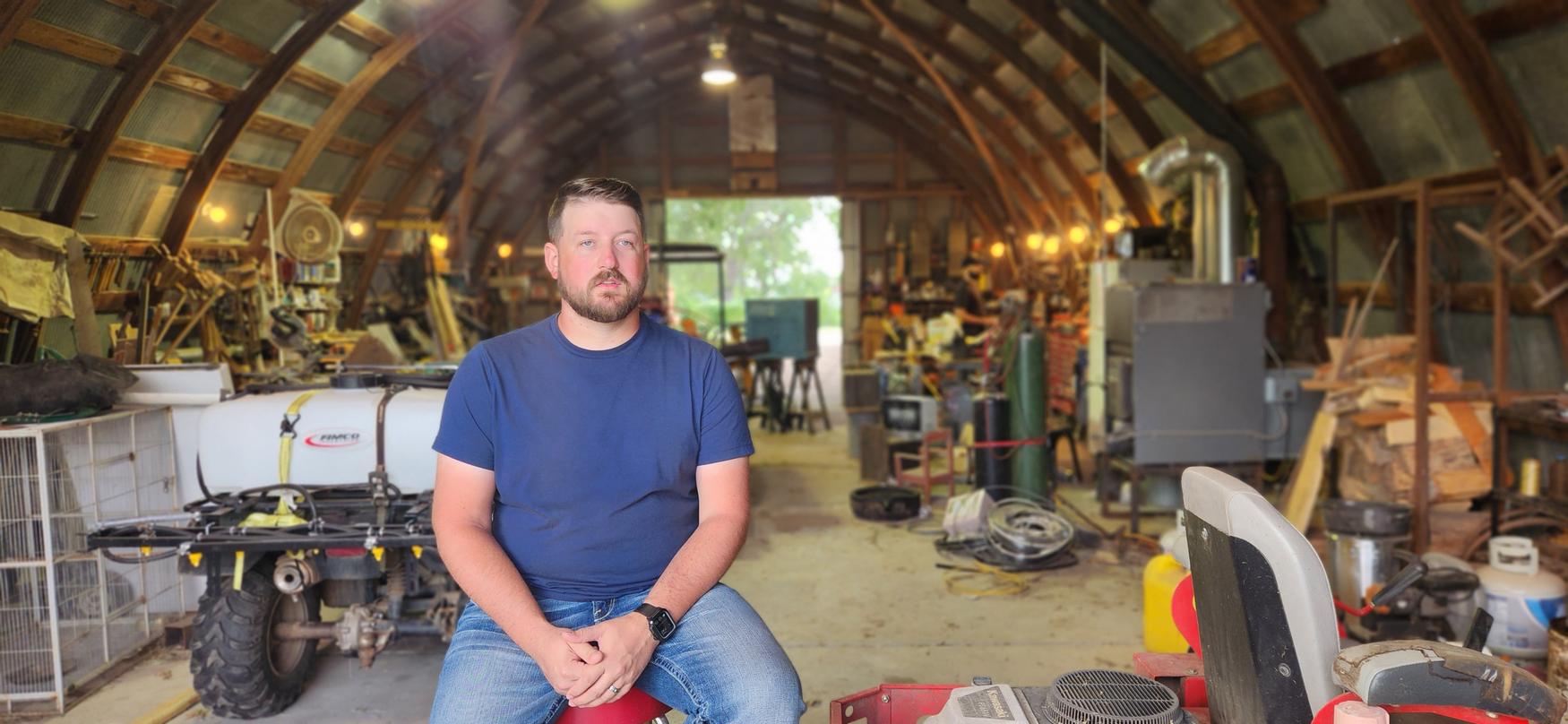 Caleb, Field Injection Operations specialist, sitting in Charm Industrial's industrial facility
