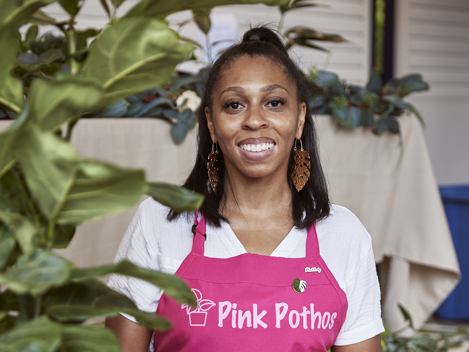 Lakeisha Jones stands in the custom container that housed her business, Pink Pothos, on the Westside Trail. Photo Credit: Erin Sintos.