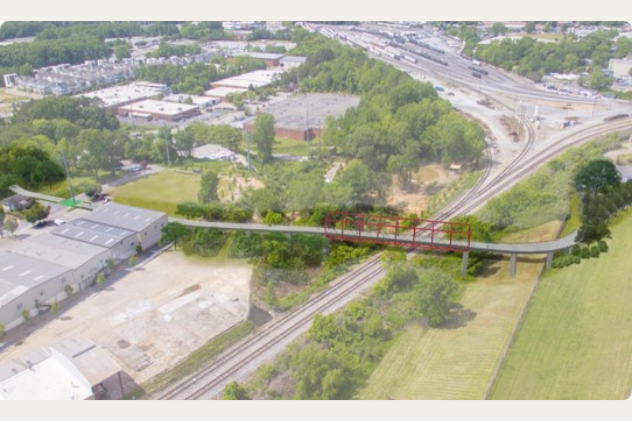 A rendering of Northwest Trail - Segment 4A, including a bridge over the railroad line. (Credit: ABI)