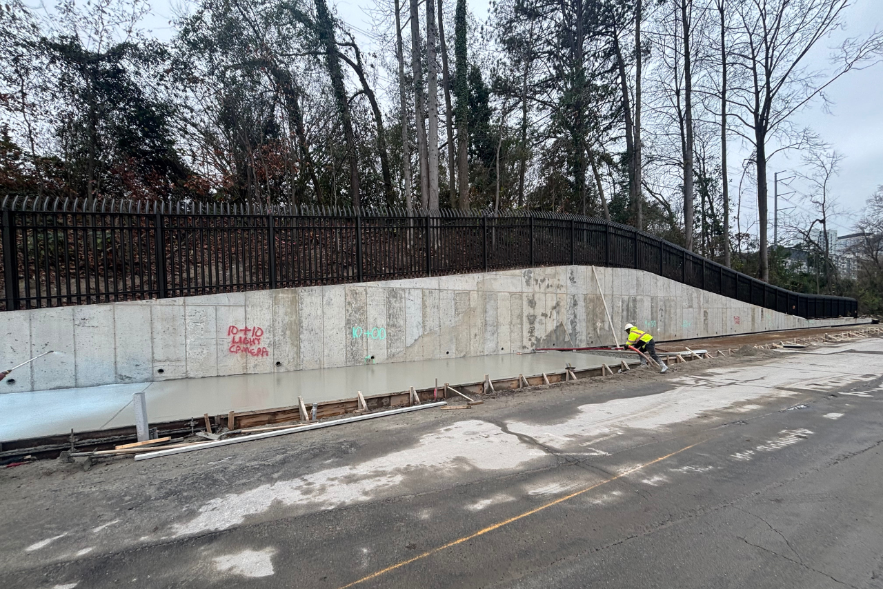 Final sections of trail concrete work in progress adjacent to Peachtree Park Apartments. (Photo Credit: ABI Staff)
