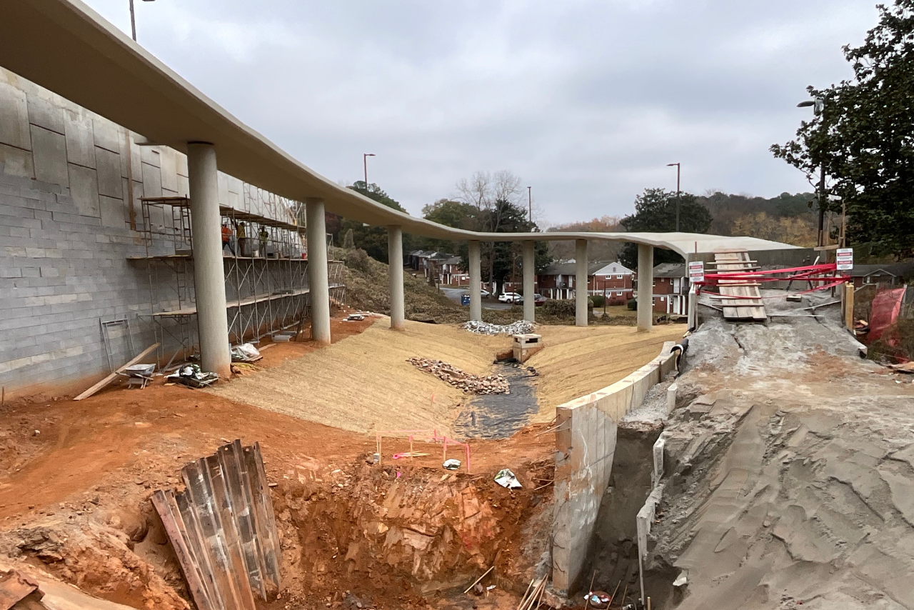 Access point ramp at United Avenue, retaining walls in progress. (Photo Credit: ABI Staff)