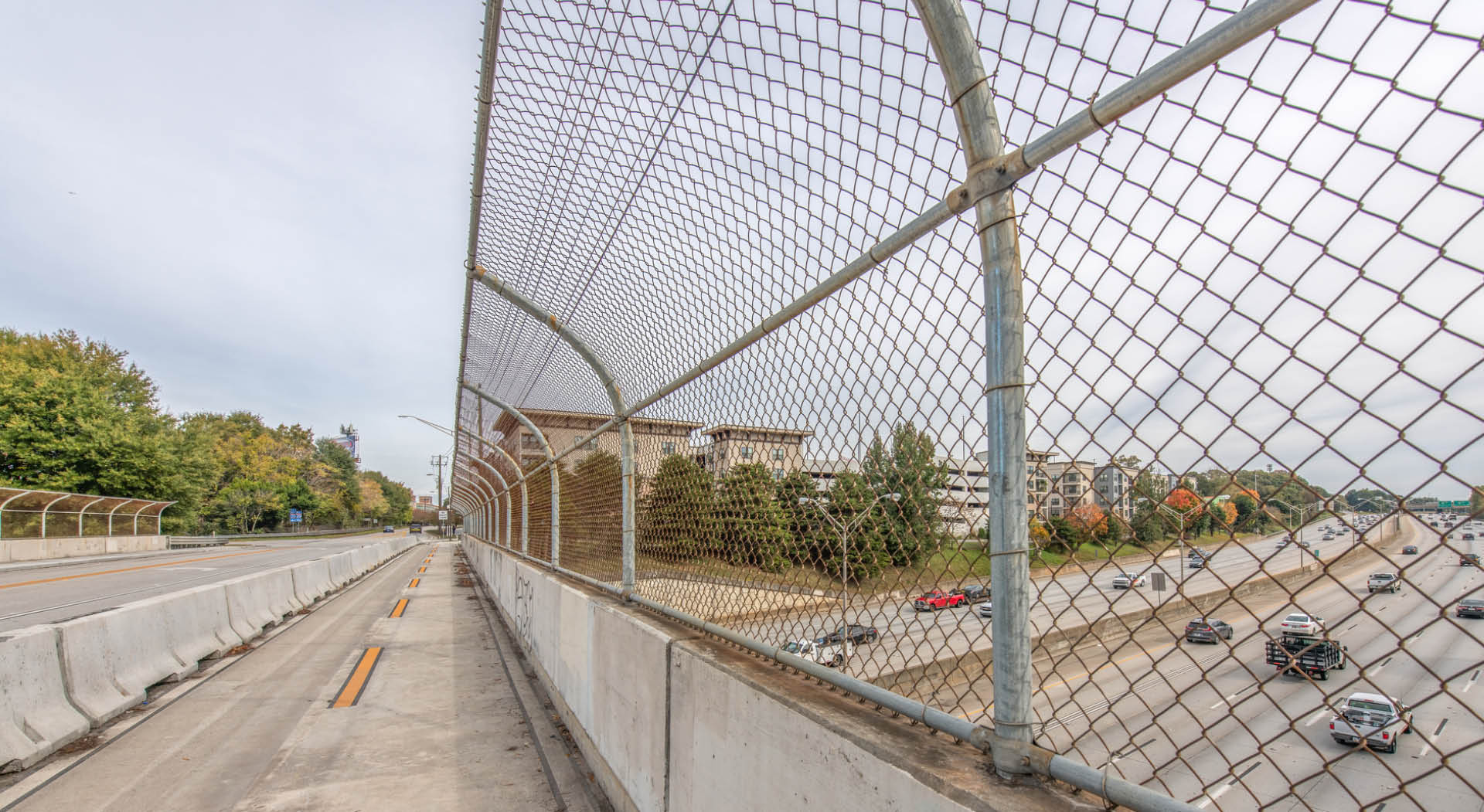 Image of the existing bridge over I-20. A new pedestrian bridge will be built adjacent to it. Photo by JandD Images.