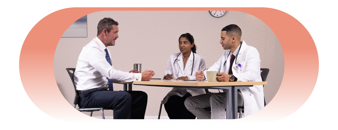 internal medicine physicians meeting with an administrator
