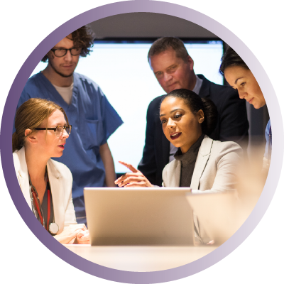 Healthcare administrators and healthcare providers speaking