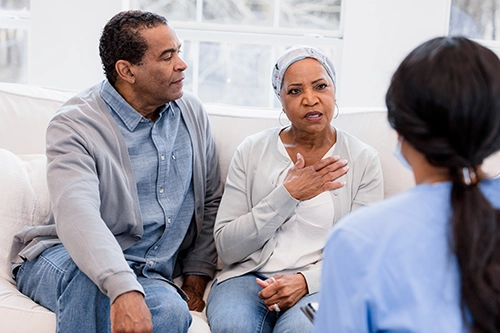 physician speaking with family