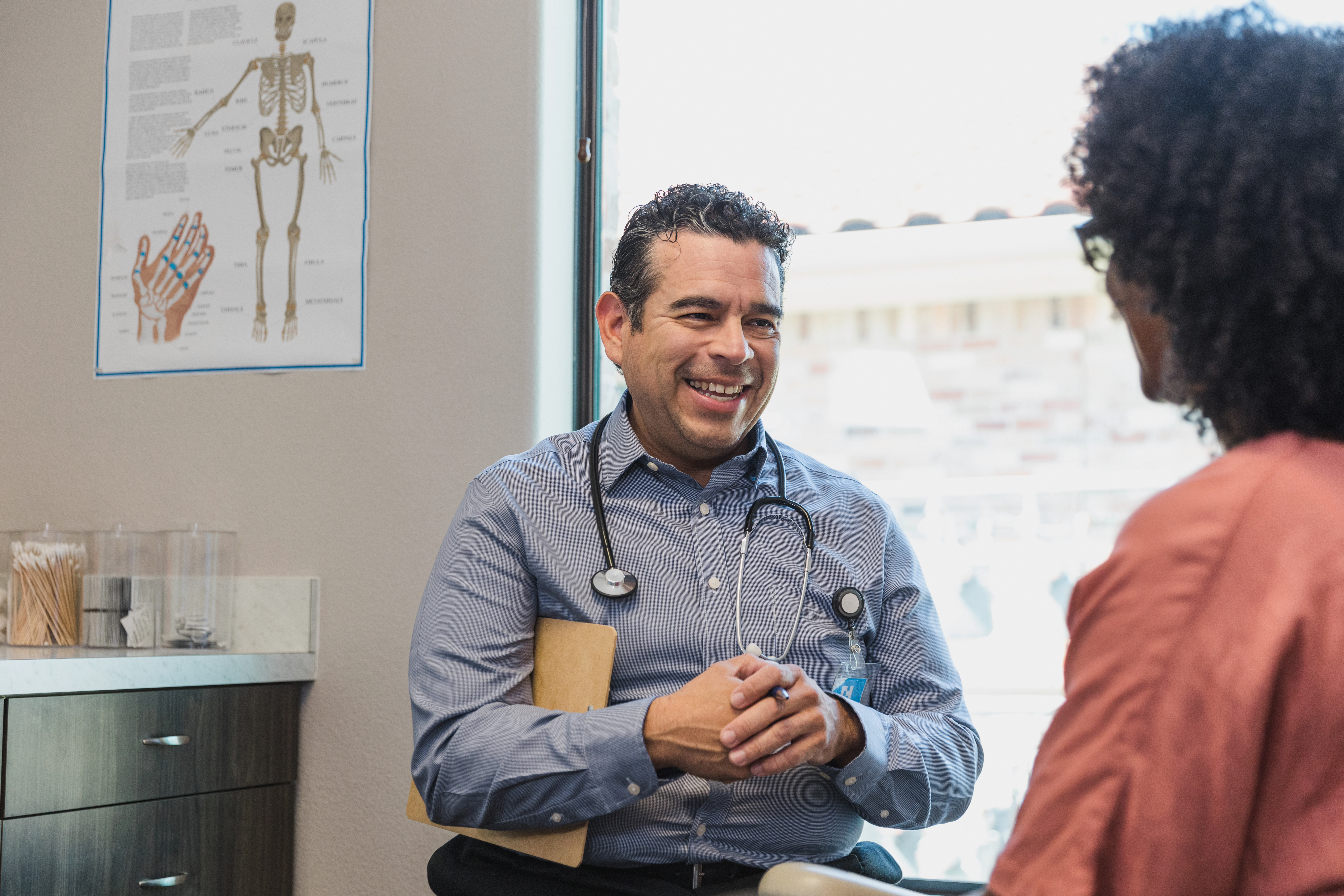 picture of physician speaking to patient
