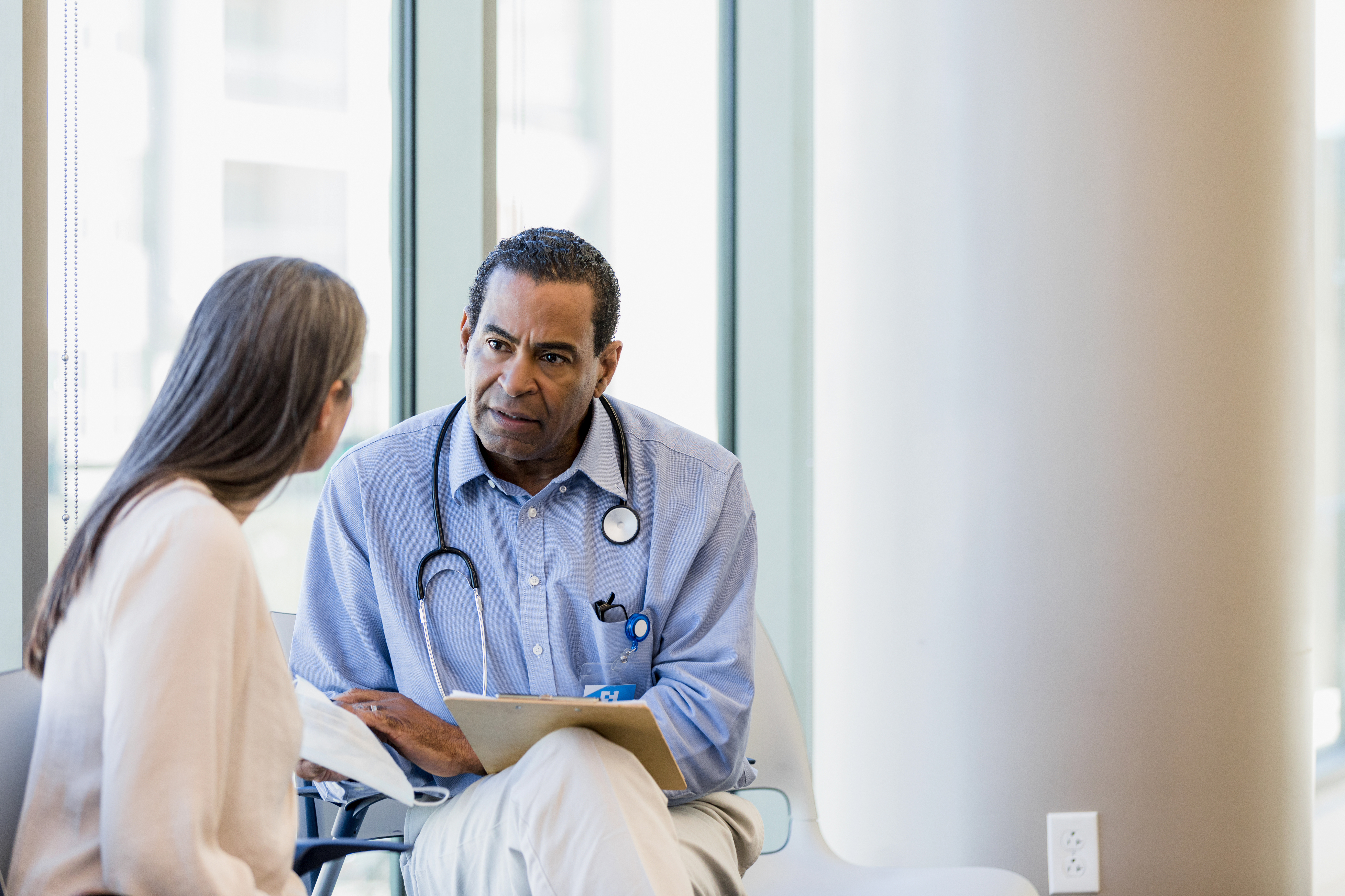 picture of a physician with a patient