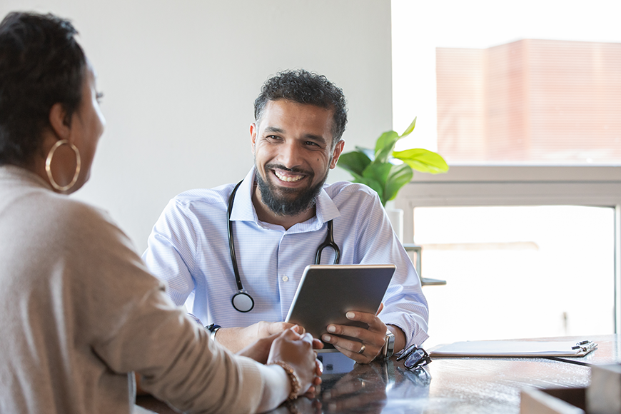 locum doctor with patient
