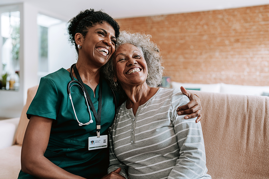 picture of smiling NP with patient