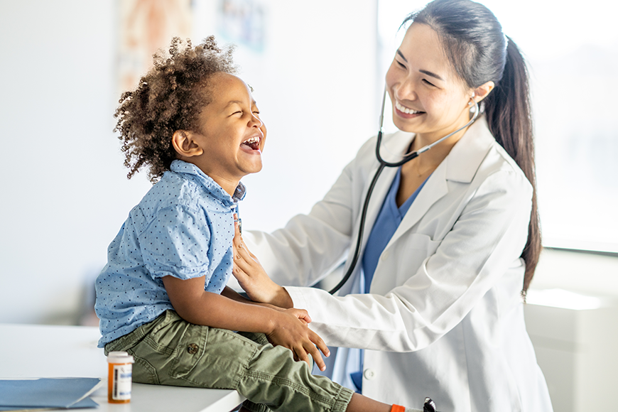 doctor with pediatric patient
