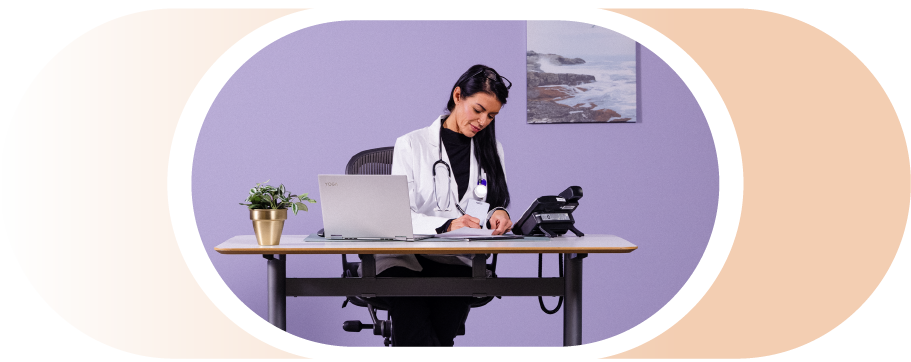 picture of a female physician charting after a telehealth call