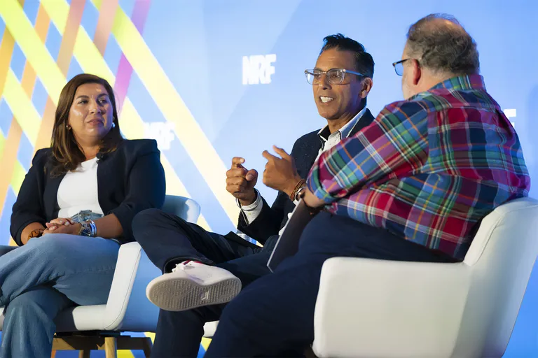 A panel discussion on stage at NRF Nexus