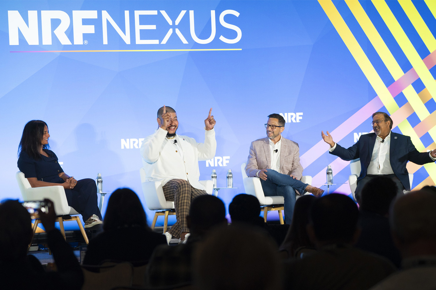 A panel discussion on stage at NRF Nexus