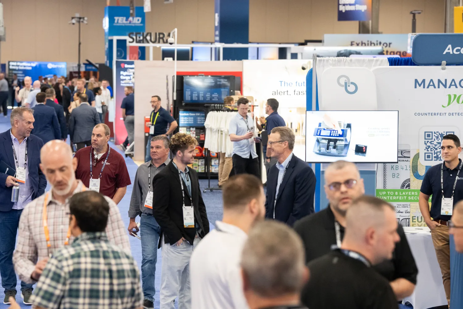 The NRF PROTECT Expo floor: dozens of booths and signs and many more people talking to representatives from companies from every aspect of the loss prevention industry.