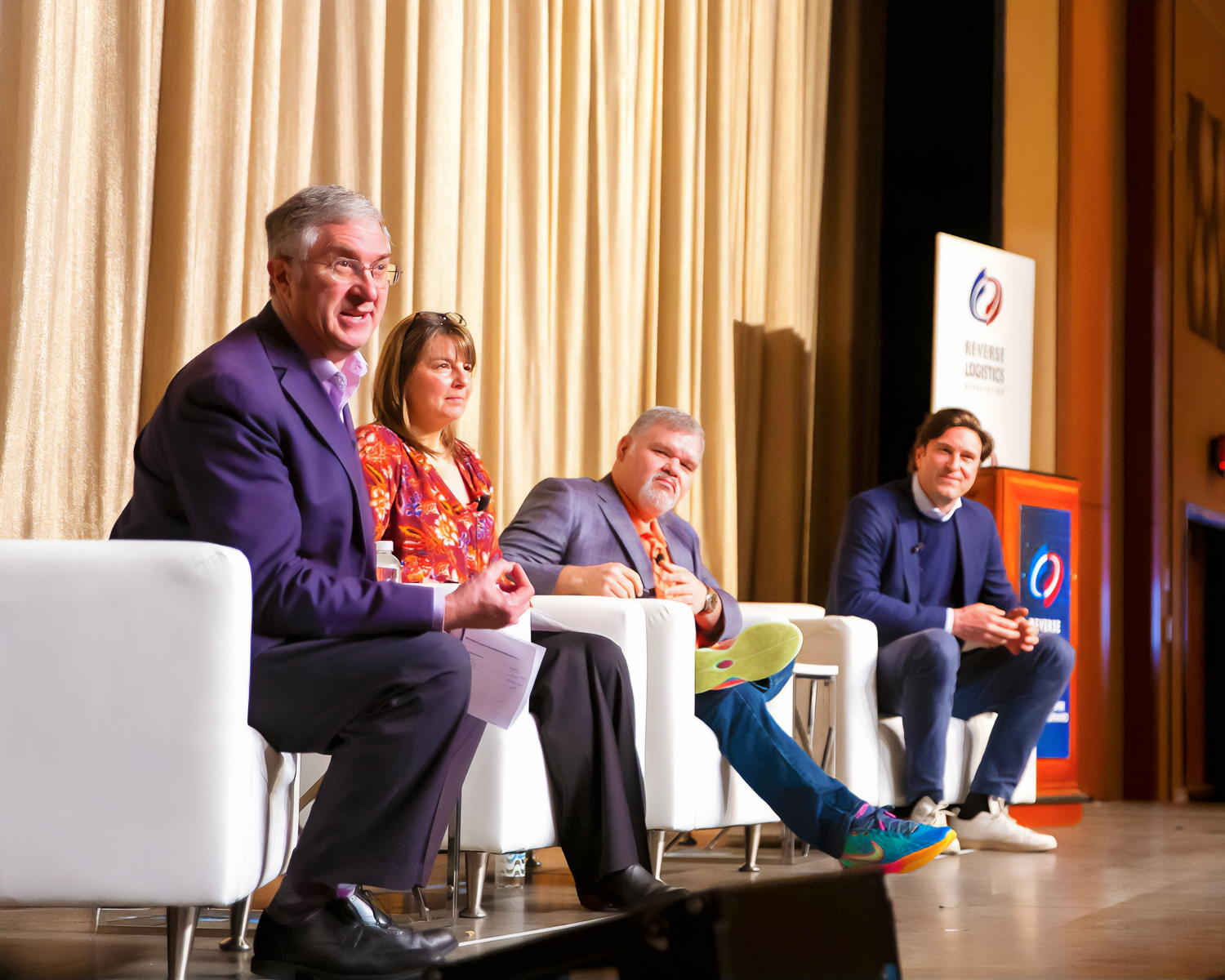 Speakers on stage at NRF Rev