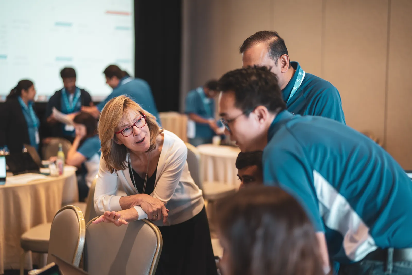 A facilitator guiding learners through a live simulation