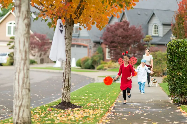Kids trick or treating for Halloween.