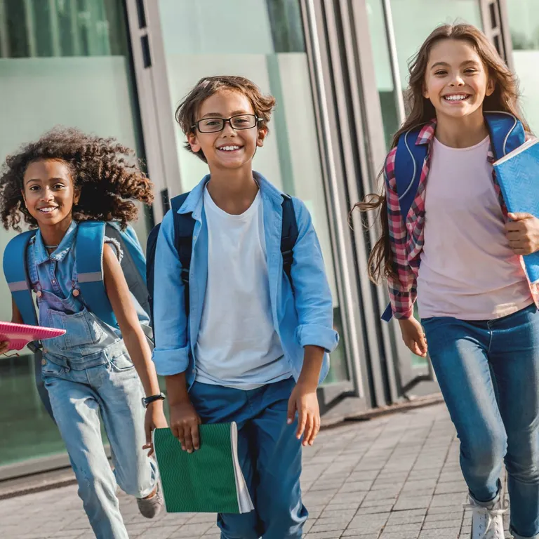 Kids running to school.