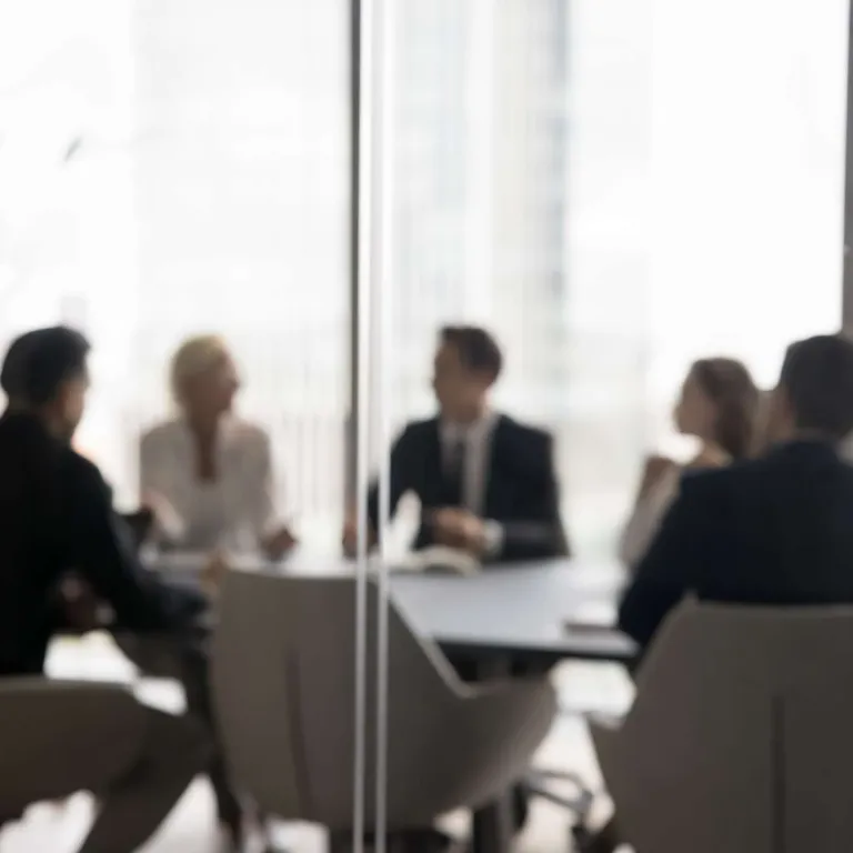 Professionals working at a table.