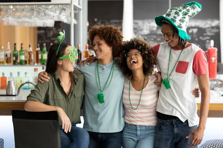 Adults celebrating St. Patrick's Day.