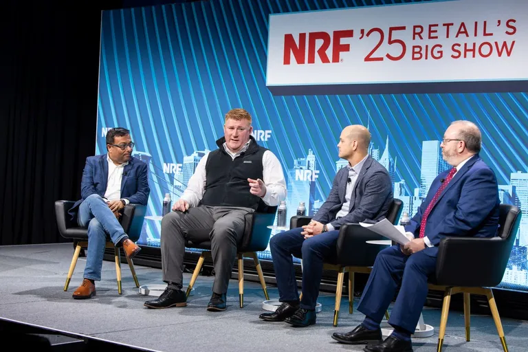 Leaders speaking on stage at NRF 2025.