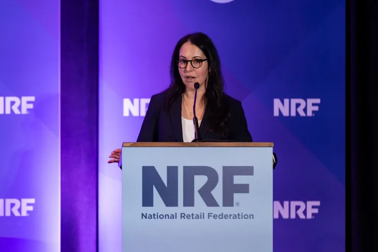 Nicole Accardi speaking at NRF PROTECT 2024.