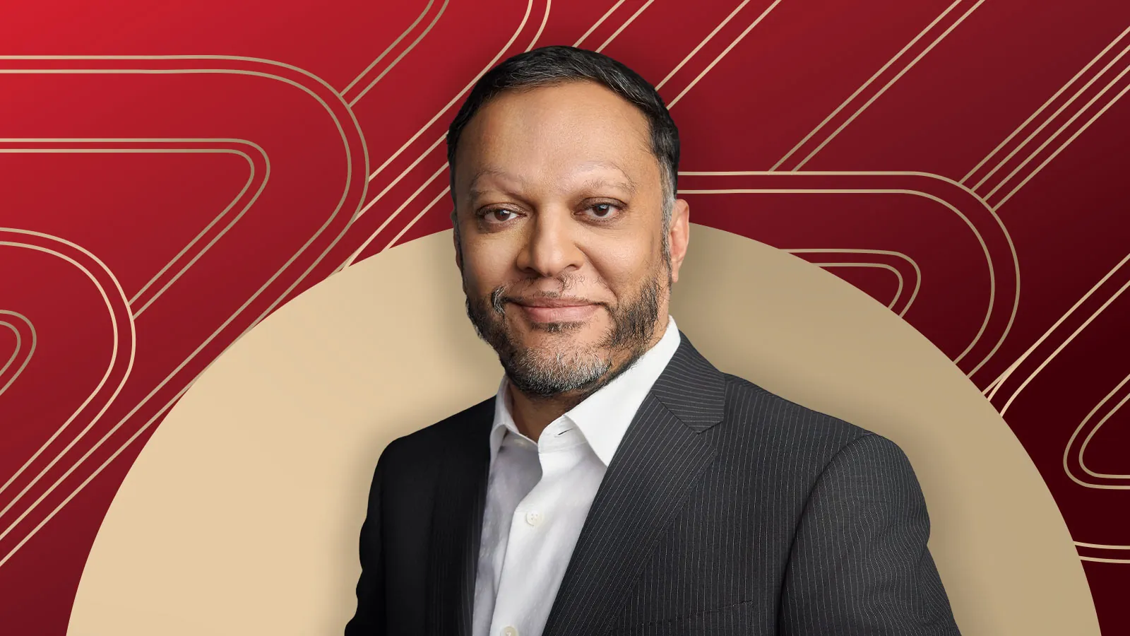 Member of "The List", Sandeep Seth, stands against a red and beige geometric background.