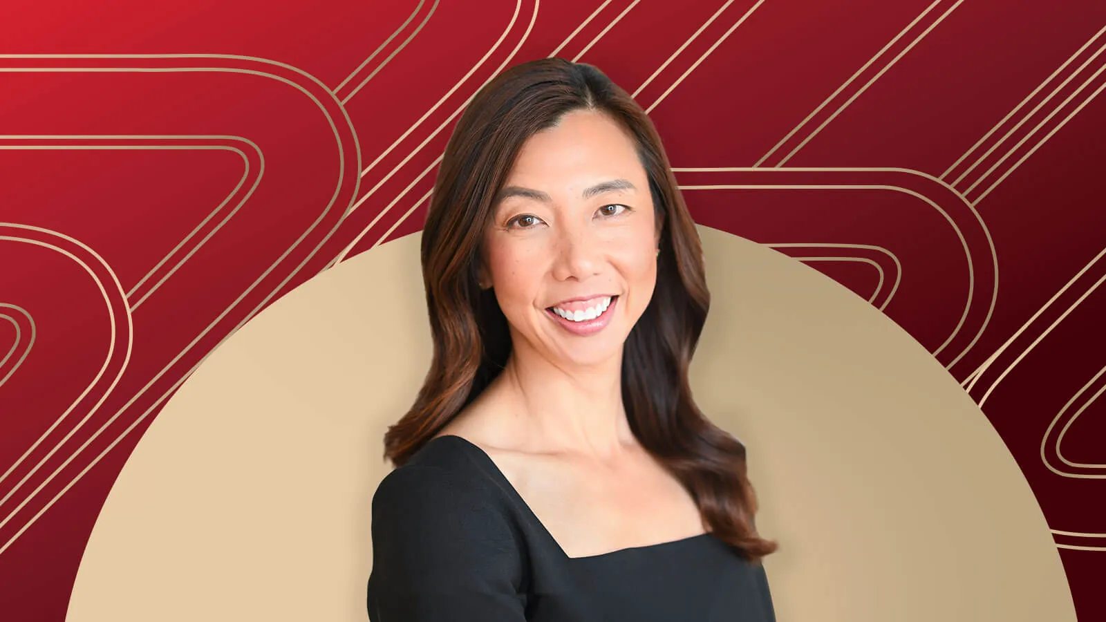 Member of "The List", Fiona Tan, stands against a red and beige geometric background.
