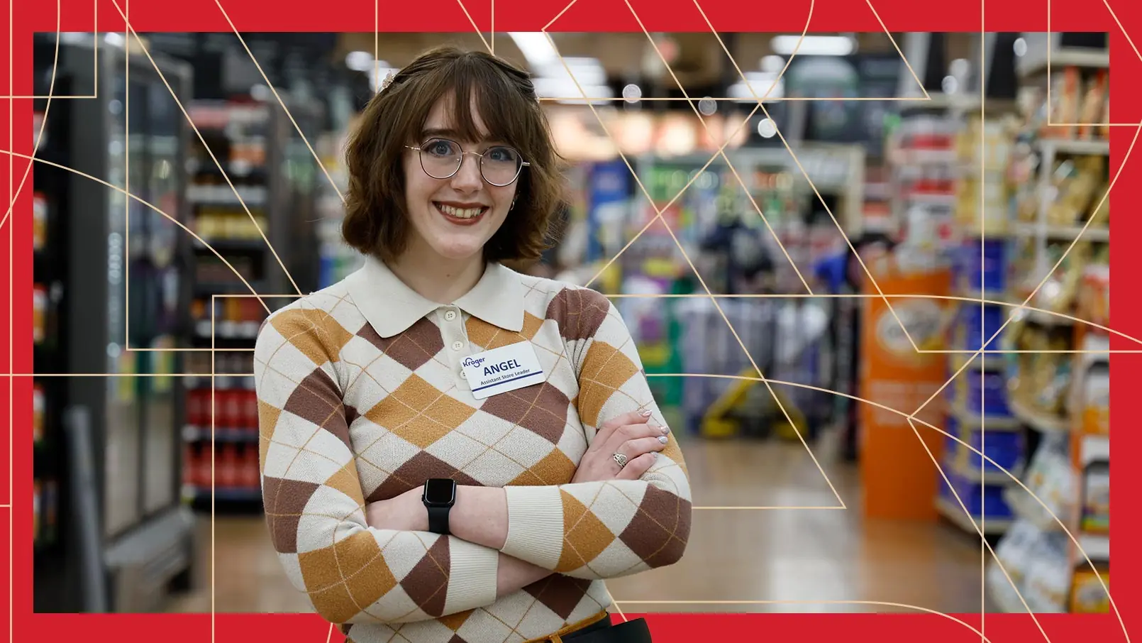 Kroger Assistant Store Leader Angel Berridge proudly poses in front of her grocery store. The photo has a red border and thin, gold, and geometric lines running through the background.