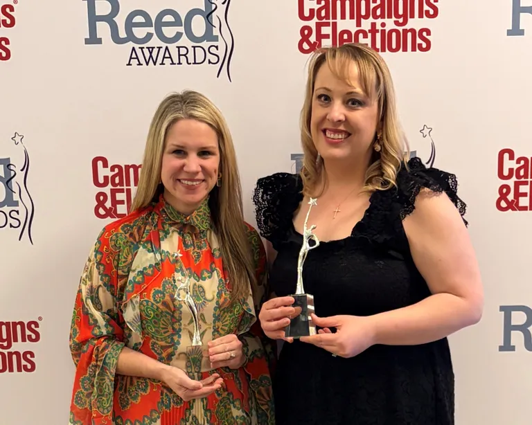 NRF's Danielle Inman and Meghan Cruz accept the Reed Award for trade association of the year