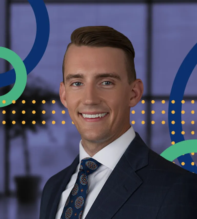 Professional bio photo of Ryan Burns overlayed upon the NRF Emerging Leaders brand colors of blue and green.