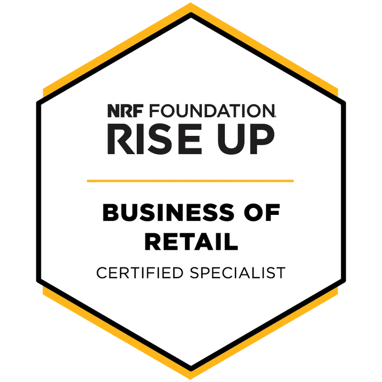 The phrase Business of Retail Certified Specialist is framed in a hexagonal, badge shape with an green outline.