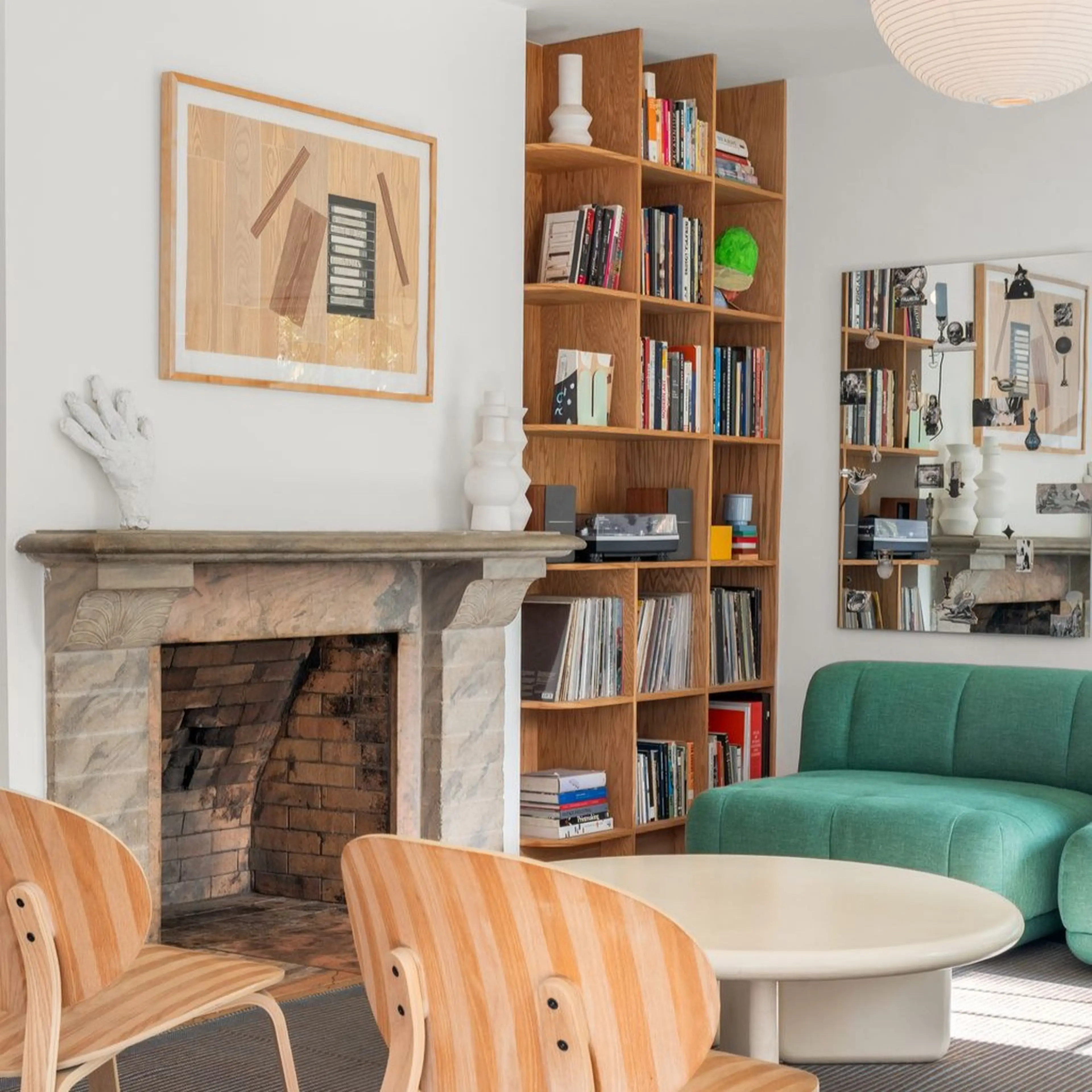 Midcentruy bookshelf and fireplace