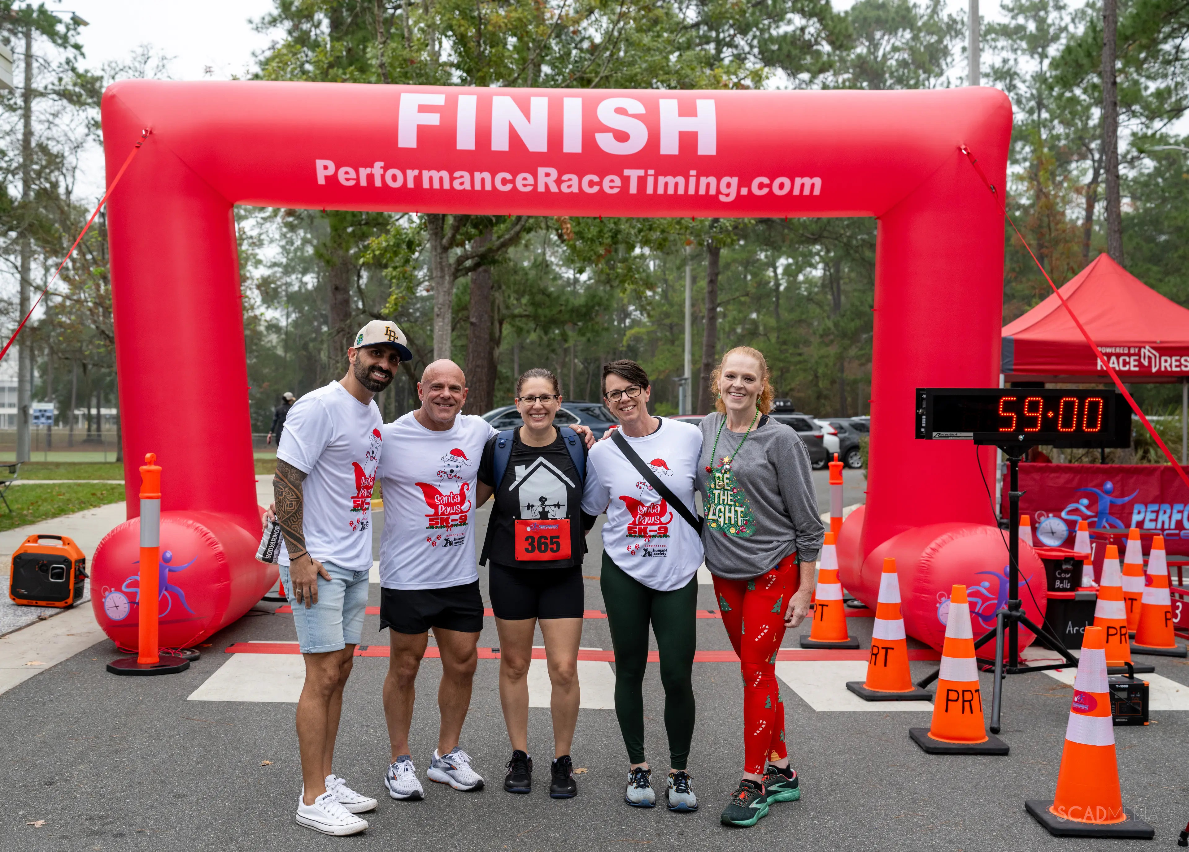 The Mills Group after the 4th Annual Santa Paws 5K-9 Race in Gainesville, Florida.